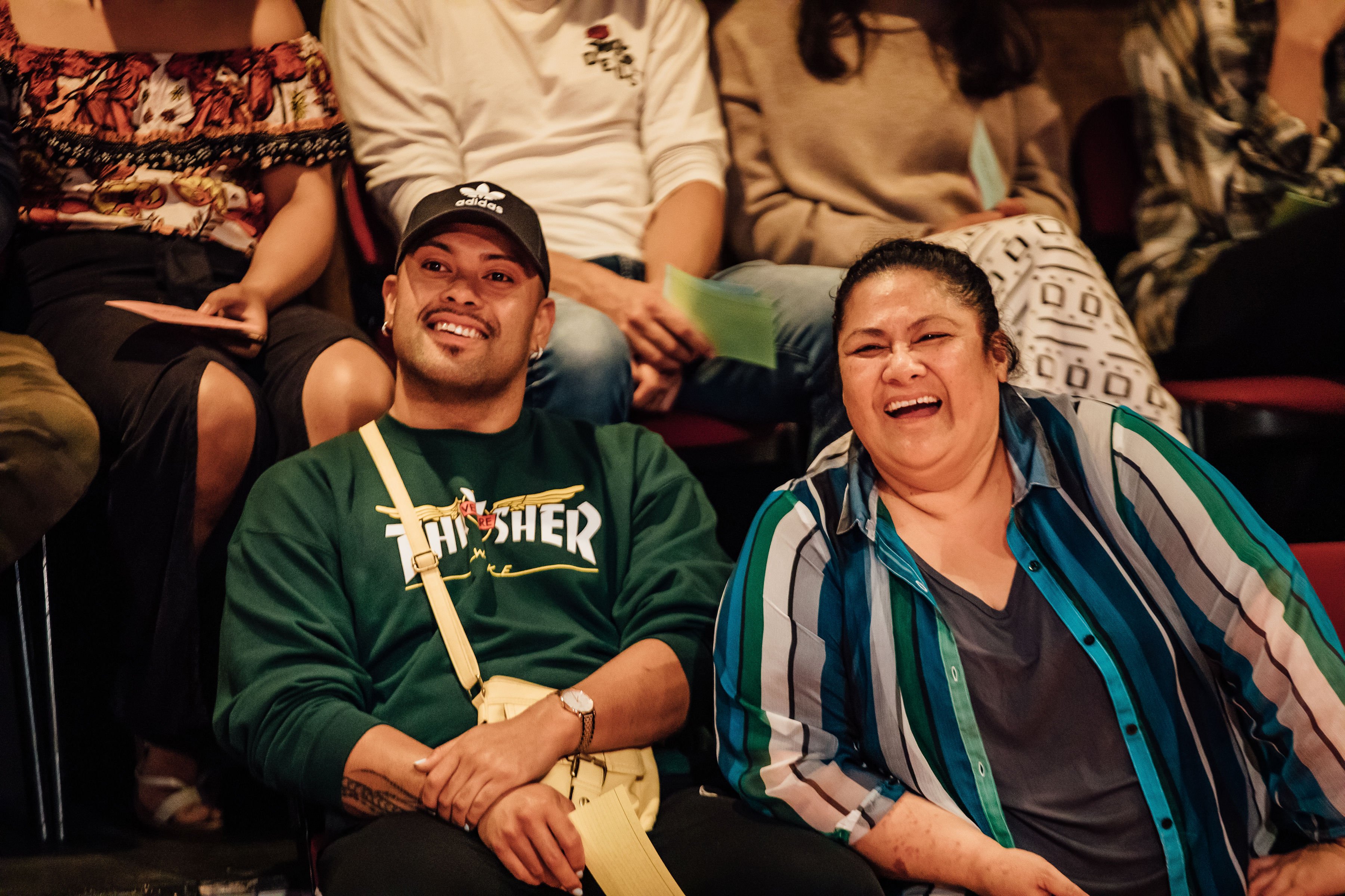 Anapela Polata'ivao smiles with an audience member Every Brilliant Thing.