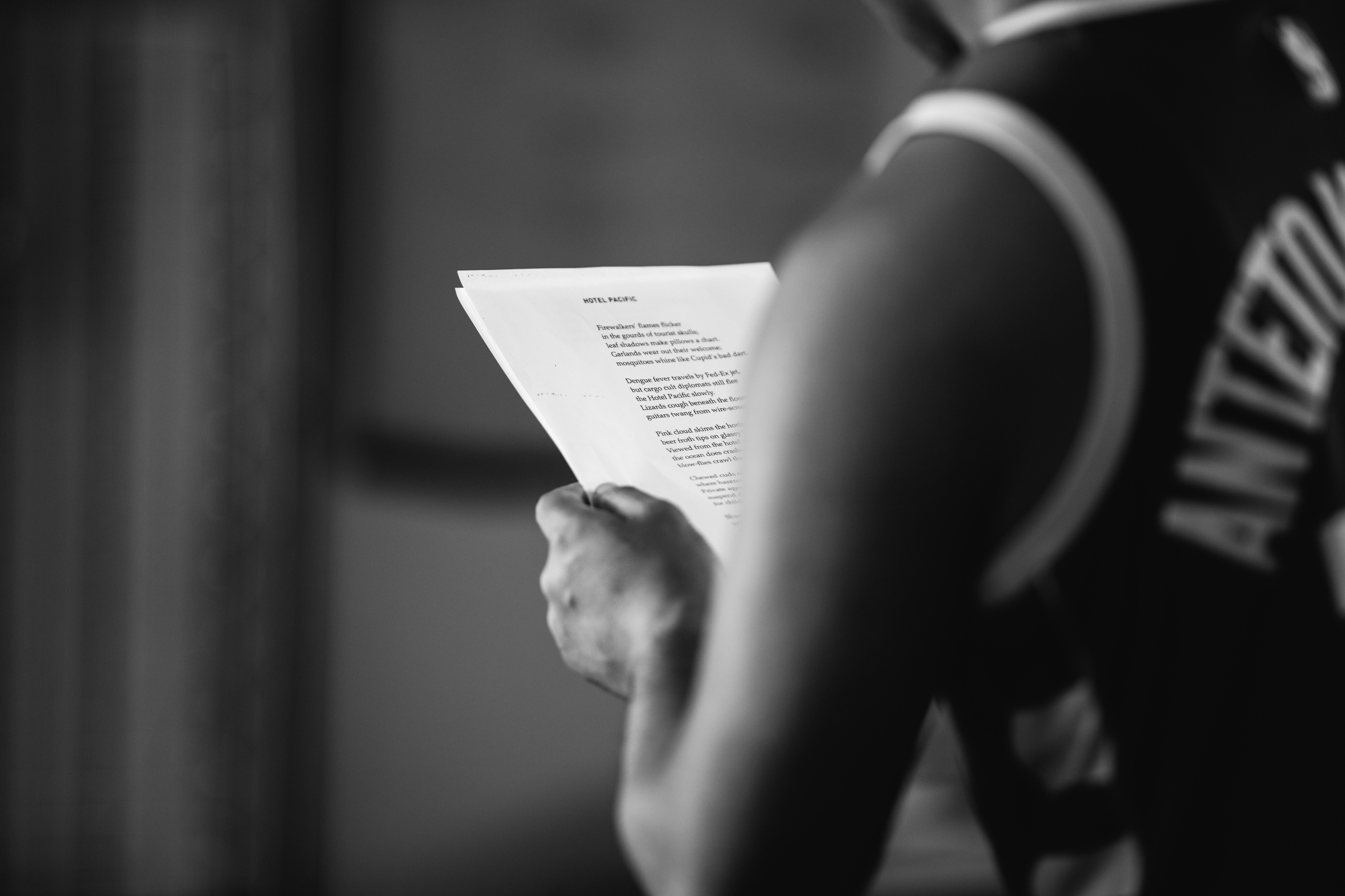 Jarod Rawiri holding a script while rehearsing UPU.